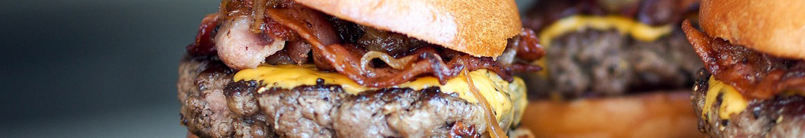 Eating Burger at Tams Burgers #28 Yucaipa restaurant in Yucaipa, CA.